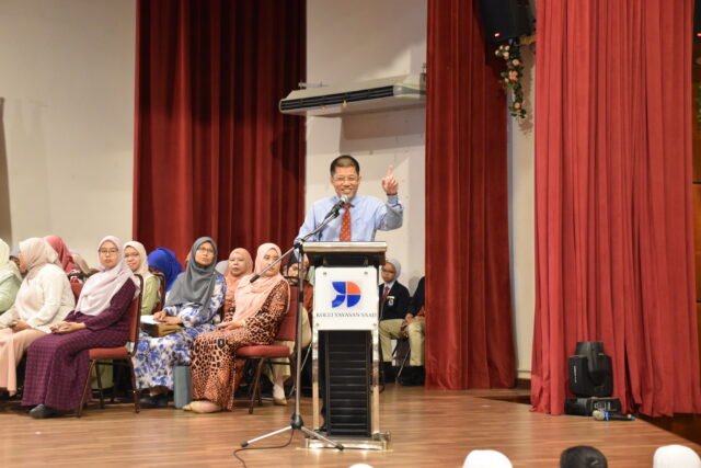 11 – Mr. Tan